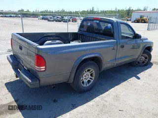 2003 Dodge Dakota with VIN 1D7FL16X53S361797, listed as a IAAI auction lot 42056555 with 243,771 mi miles and . Bid and sale history available at carsss.com. Image 4.