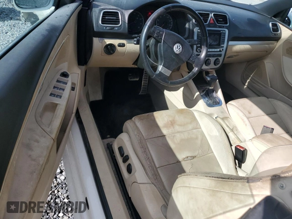 2007 Volkswagen Eos 2.0T with VIN WVWDA71F17V029238, listed as a Copart auction lot 85494274 with 98,674 mi miles and Salvage Title. Bid and sale history available at DreamBid. Image 8.