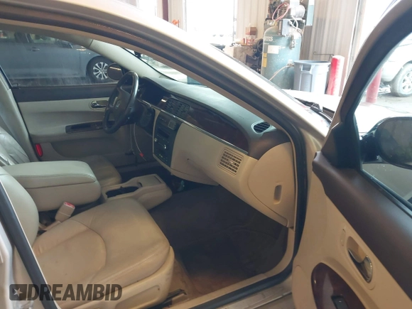 2009 Buick LaCrosse CXL with VIN 2G4WD582X91106342, listed as a IAAI auction lot 42140238 with 139,645 mi miles and . Bid and sale history available at DreamBid. Image 5.