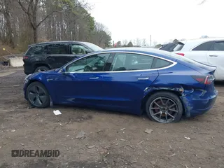 2020 Tesla Model 3 Standard Range Plus with VIN 5YJ3E1EA1LF658521, listed as a IAAI auction lot 41804722 with 83,248 mi miles and . Bid and sale history available at DreamBid. Image 14.