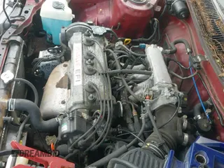 1990 Toyota Corolla z VIN JT2AE94E4L3336732, wystawiony jako IAAI lot #42206970 z przebiegiem 255 396 mil mil oraz . Historia ofert i sprzedaży dostępna na DreamBid. Obrazek 19.