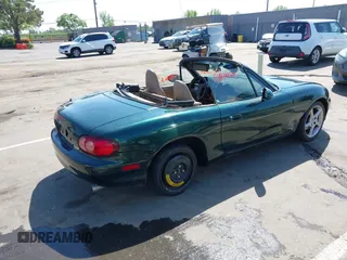 2001 Mazda MX-5 Miata with VIN JM1NB353410203981, listed as a IAAI auction lot 42028077 with Not Provided miles and . Bid and sale history available at DreamBid. Image 4.