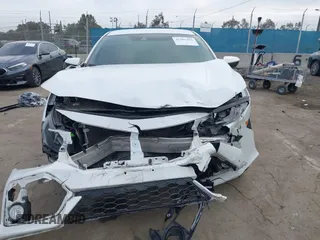 2021 Honda Civic Sport with VIN SHHFK7H42MU419784, listed as a IAAI auction lot 42202495 with 55,958 mi miles and . Bid and sale history available at DreamBid. Image 12.