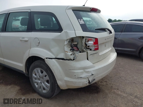 2013 Dodge Journey American Value with VIN 3C4PDCAB2DT675622, listed as a IAAI auction lot 42626554 with 103,169 mi miles and . Bid and sale history available at DreamBid. Image 6.