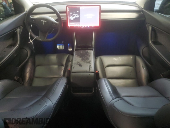 2021 Tesla Model Y Long Range with VIN 5YJYGDEE0MF076660, listed as a Copart auction lot 55957365 with 80,432 mi miles and Salvage Title. Bid and sale history available at DreamBid. Image 8.