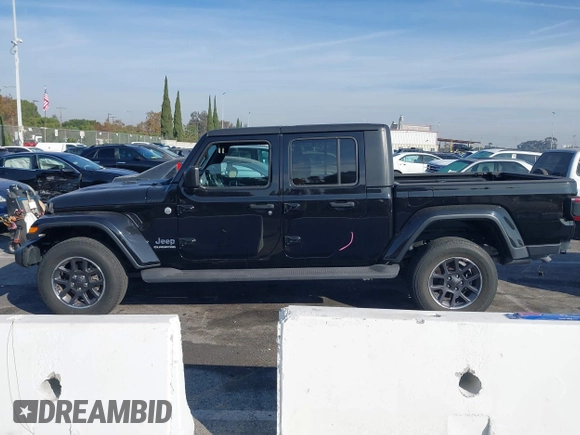 2020 Jeep Gladiator Overland with VIN 1C6HJTFG7LL139980, listed as a IAAI auction lot 40713794 with 33,560 mi miles and . Bid and sale history available at DreamBid. Image 15.