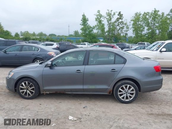 2011 Volkswagen Jetta SE with VIN 3VWDZ7AJ4BM370033, listed as a IAAI auction lot 42367238 with 161,635 mi miles and . Bid and sale history available at DreamBid. Image 14.