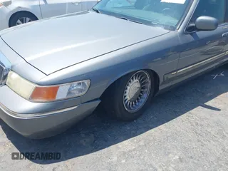 2000 Mercury Grand Marquis GS z VIN 2MEFM74W8YX662409, wystawiony jako IAAI lot #42438486 z przebiegiem 191 248 mil mil oraz . Historia ofert i sprzedaży dostępna na DreamBid. Obrazek 6.