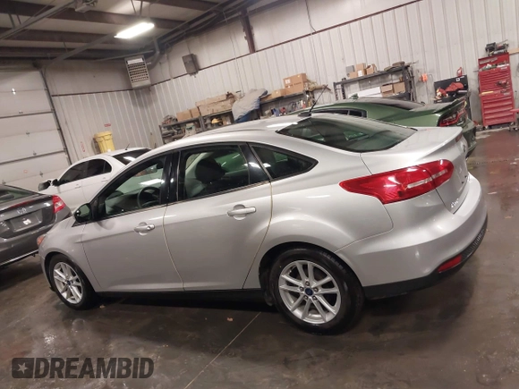 2015 Ford Focus SE with VIN 1FADP3F28FL357382, listed as a IAAI auction lot 41223441 with 47,682 mi miles. Bid and sale history available at carsss.com. Image 14.