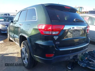 2011 Jeep Grand Cherokee Overland with VIN 1J4RS6GG0BC739372, listed as a IAAI auction lot 36440389 with 102,976 mi miles and . Bid and sale history available at DreamBid. Image 3.