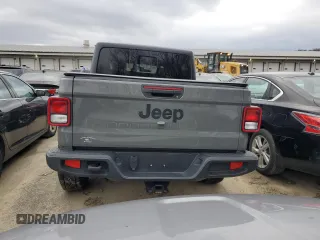 2022 Jeep Gladiator Willys с VIN 1C6HJTAG8NL107002, выставлен на аукционе Copart как лот 85138204 с пробегом 69 166 миль миль и Списание • Salvage title. История ставок и продаж доступна на DreamBid. Изображение 6.