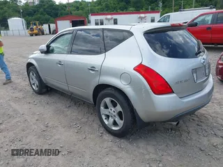 2003 Nissan Murano SE z VIN JN8AZ08W43W214000, wystawiony jako IAAI lot #42274384 z przebiegiem 98 927 mil mil oraz . Historia ofert i sprzedaży dostępna na DreamBid. Obrazek 3.