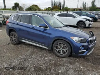 2018 BMW X1 sDrive28i with VIN WBXHU7C33J3F04439, listed as a Copart auction lot 45034033 with 28,091 mi miles. Bid and sale history available at carsss.com. Image 4.