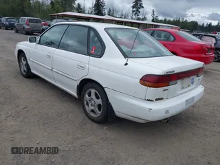 1996 Subaru Legacy with VIN 4S3BD4559T7202906, listed as a IAAI auction lot 42214410 with 211,118 mi miles and . Bid and sale history available at DreamBid. Image 3.