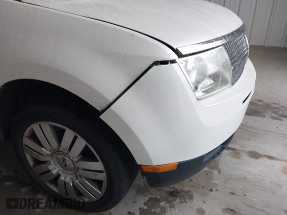 2009 Lincoln MKX z VIN 2LMDU88C79BJ05133, wystawiony jako IAAI lot #42268132 z przebiegiem 225 092 mil mil oraz . Historia ofert i sprzedaży dostępna na DreamBid. Obrazek 12.