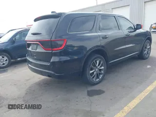 2015 Dodge Durango SXT with VIN 1C4RDJAGXFC796034, listed as a IAAI auction lot 42057983 with 159,108 mi miles and . Bid and sale history available at DreamBid. Image 4.
