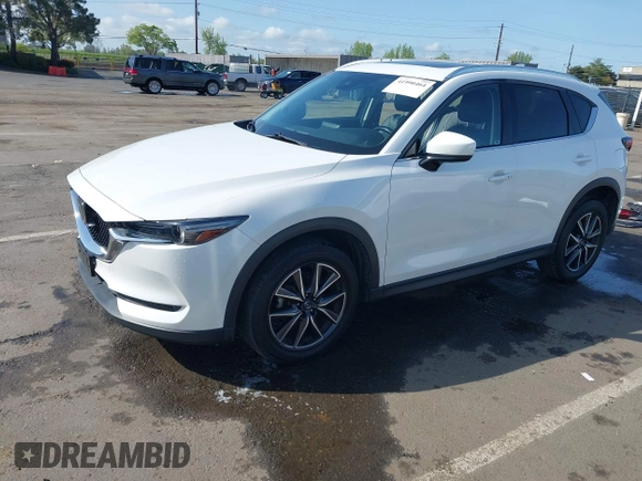 2017 Mazda CX-5 Grand Touring with VIN JM3KFADLXH0222341, listed as a IAAI auction lot 41990464 with 94,374 mi miles and . Bid and sale history available at carsss.com. Image 20.