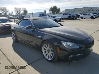 2012 BMW 6 Series 650i z VIN WBALZ3C51CDL72422, wystawiony jako Copart lot #87447914 z przebiegiem 115 376 mil mil oraz Szkody całkowita. Historia ofert i sprzedaży dostępna na DreamBid. Obrazek 4.