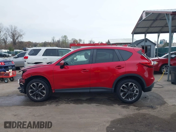 2016 Mazda CX-5 Grand Touring with VIN JM3KE4DY9G0865780, listed as a IAAI auction lot 41913914 with 76,579 mi miles. Bid and sale history available at carsss.com. Image 15.
