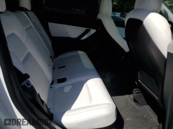 2020 Tesla Model Y Long Range with VIN 5YJYGDEF9LF023060, listed as a Copart auction lot 55462395 with 58,211 mi miles and Salvage Title. Bid and sale history available at DreamBid. Image 11.
