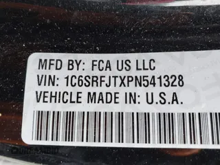 2023 Ram 1500 Laramie with VIN 1C6SRFJTXPN541328, listed as a IAAI auction lot 42121615 with 61,939 mi miles and . Bid and sale history available at DreamBid. Image 9.