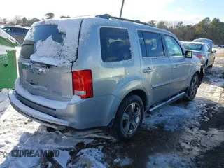 2015 Honda Pilot SE with VIN 5FNYF4H33FB064910, listed as a IAAI auction lot 41357315 with 115,879 mi miles and . Bid and sale history available at DreamBid. Image 4.
