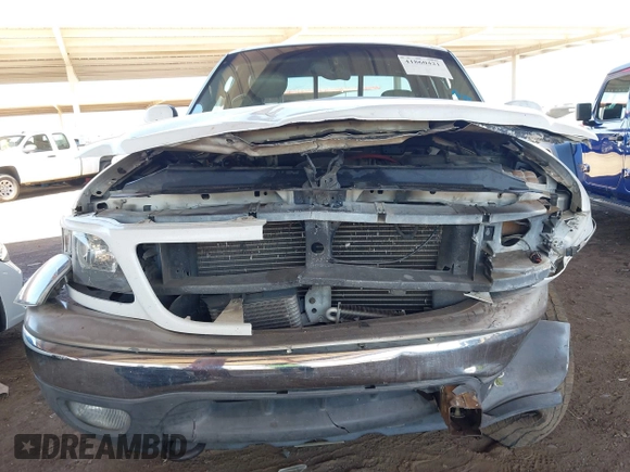 2003 Ford F-150 XL with VIN 1FTRX18L03NA45728, listed as a IAAI auction lot 41860421 with 179,596 mi miles. Bid and sale history available at carsss.com. Image 6.