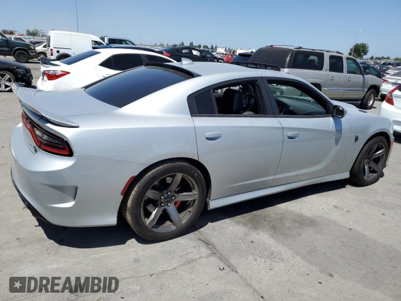 2019 Dodge Charger SRT Hellcat with VIN 2C3CDXL96KH588025, listed as a Copart auction lot 64705614 with 49,659 mi miles and Salvage Title. Bid and sale history available at DreamBid. Image 3.