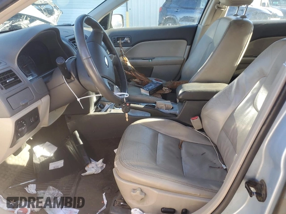 2010 Ford Fusion Hybrid with VIN 3FADP0L36AR288813, listed as a Copart auction lot 52039765 with 184,238 mi miles and Salvage title. Bid and sale history available at DreamBid. Image 7.
