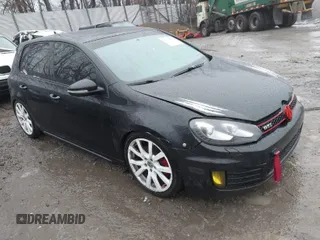 2012 Volkswagen GTI w/Sunroof & Navi PZEV z VIN WVWGD7AJ9CW015665, wystawiony jako IAAI lot #41516063 z przebiegiem 152 715 mil mil oraz . Historia ofert i sprzedaży dostępna na DreamBid. Obrazek 1.
