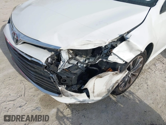 2016 Toyota Avalon Limited with VIN 4T1BK1EB8GU227552, listed as a IAAI auction lot 41857342 with 164,546 mi miles and . Bid and sale history available at carsss.com. Image 6.