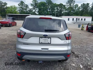 2017 Ford Escape SE z VIN 1FMCU9GD3HUA74463, wystawiony jako IAAI lot #42496171 z przebiegiem 160 534 mil mil oraz . Historia ofert i sprzedaży dostępna na DreamBid. Obrazek 16.