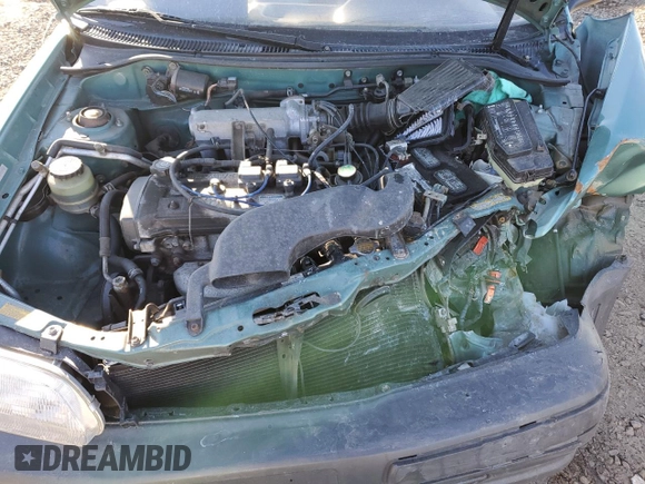 1996 Toyota Tercel DX z VIN JT2AC52L6T0170537, wystawiony jako Copart lot #42576525 z przebiegiem 66 926 mil mil oraz Szkoda całkowita • Salvage title. Historia ofert i sprzedaży dostępna na DreamBid. Obrazek 11.