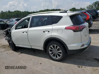 2016 Toyota RAV4 Limited with VIN JTMDJREV4GD026028, listed as a Copart auction lot 63848635 with 90,104 mi miles and Salvage title. Bid and sale history available at DreamBid. Image 2.