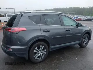 2018 Toyota RAV4 LE with VIN 2T3BFREV8JW850391, listed as a IAAI auction lot 42487413 with 66,866 mi miles and . Bid and sale history available at DreamBid. Image 4.