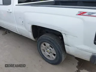 2015 Chevrolet Silverado 1500 LT with VIN 1GCRCREC3FZ425576, listed as a IAAI auction lot 41903363 with 114,156 mi miles and . Bid and sale history available at DreamBid. Image 17.