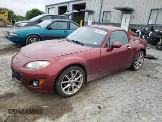 2010 Mazda MX-5 Miata Grand Touring with VIN JM1NC2FF8A0211579, listed as a Copart auction lot 62921425 with 136,503 mi miles and Salvage title. Bid and sale history available at DreamBid. Image 1.