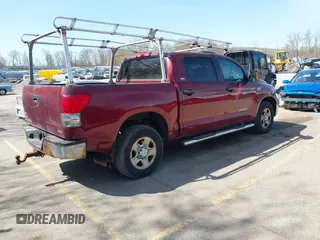 2007 Toyota Tundra SR5 with VIN 5TBDV54117S487602, listed as a IAAI auction lot 42106287 with 214,725 mi miles. Bid and sale history available at carsss.com. Image 4.
