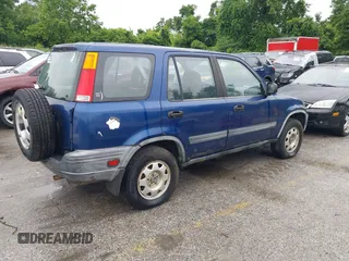 1999 Honda CR-V LX z VIN JHLRD1843XC010302, wystawiony jako IAAI lot #42523518 z przebiegiem 260 047 mil mil oraz . Historia ofert i sprzedaży dostępna na DreamBid. Obrazek 4.