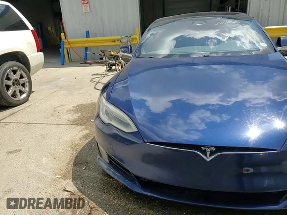 2017 Tesla Model S 60 с VIN 5YJSA1E14HF185924, выставлен на аукционе Copart как лот 57101065 с пробегом 68 268 миль миль и На запчасти • Non repairable. История ставок и продаж доступна на DreamBid. Изображение 14.
