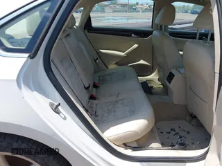 2014 Volkswagen Passat SEL Premium z VIN 1VWCN7A37EC077905, wystawiony jako IAAI lot #42421674 z przebiegiem 83 889 mil mil oraz . Historia ofert i sprzedaży dostępna na DreamBid. Obrazek 8.