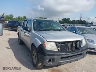 2014 Nissan Frontier SV with VIN 1N6AD0ER3EN731089, listed as a IAAI auction lot 42007697 with 140,652 mi miles. Bid and sale history available at carsss.com. Image 1.