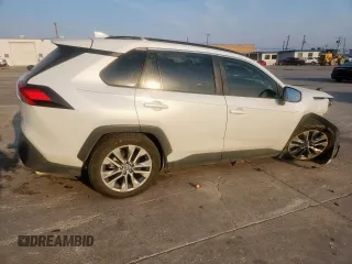 2022 Toyota RAV4 XLE Premium with VIN 2T3A1RFV7NW267132, listed as a Copart auction lot 57172245 with 21,350 mi miles and Salvage title. Bid and sale history available at DreamBid. Image 3.