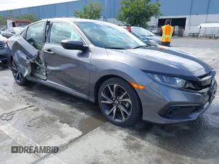 2019 Honda Civic Sport with VIN 2HGFC2F80KH546677, listed as a IAAI auction lot 41921290 with 35,268 mi miles and . Bid and sale history available at DreamBid. Image 1.