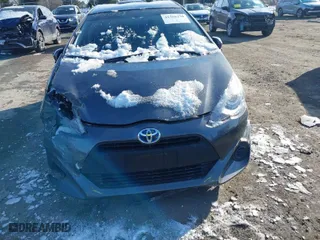 2015 Toyota Prius c One with VIN JTDKDTB36F1113749, listed as a IAAI auction lot 41366238 with 121,610 mi miles. Bid and sale history available at carsss.com. Image 12.