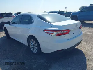 2019 Toyota Camry LE with VIN 4T1B11HK9KU825107, listed as a IAAI auction lot 41971159 with 15,802 mi miles and . Bid and sale history available at DreamBid. Image 3.