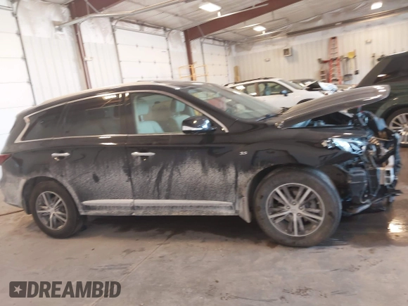 2019 Infiniti QX60 Luxe with VIN 5N1DL0MM6KC548023, listed as a IAAI auction lot 42267143 with 94,231 mi miles and . Bid and sale history available at DreamBid. Image 13.