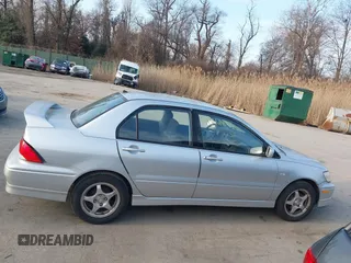 2003 Mitsubishi Lancer OZ-Rally with VIN JA3AJ86E63U022390, listed as a IAAI auction lot 41542407 with 184,639 mi miles. Bid and sale history available at carsss.com. Image 13.