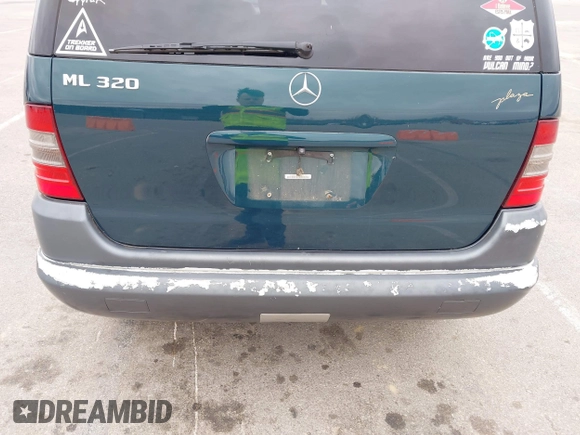 1999 Mercedes-Benz M 320/430/500 with VIN 4JGAB54E8XA055359, listed as a IAAI auction lot 41808170 with 161,573 mi miles and . Bid and sale history available at DreamBid. Image 6.