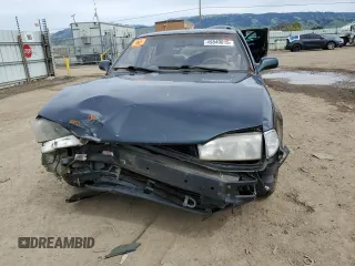 1994 Toyota Camry LE z VIN JT2GK12E2R0039606, wystawiony jako Copart lot #49840015 z przebiegiem 197 834 mil mil oraz Szkoda całkowita • Salvage title. Historia ofert i sprzedaży dostępna na DreamBid. Obrazek 5.